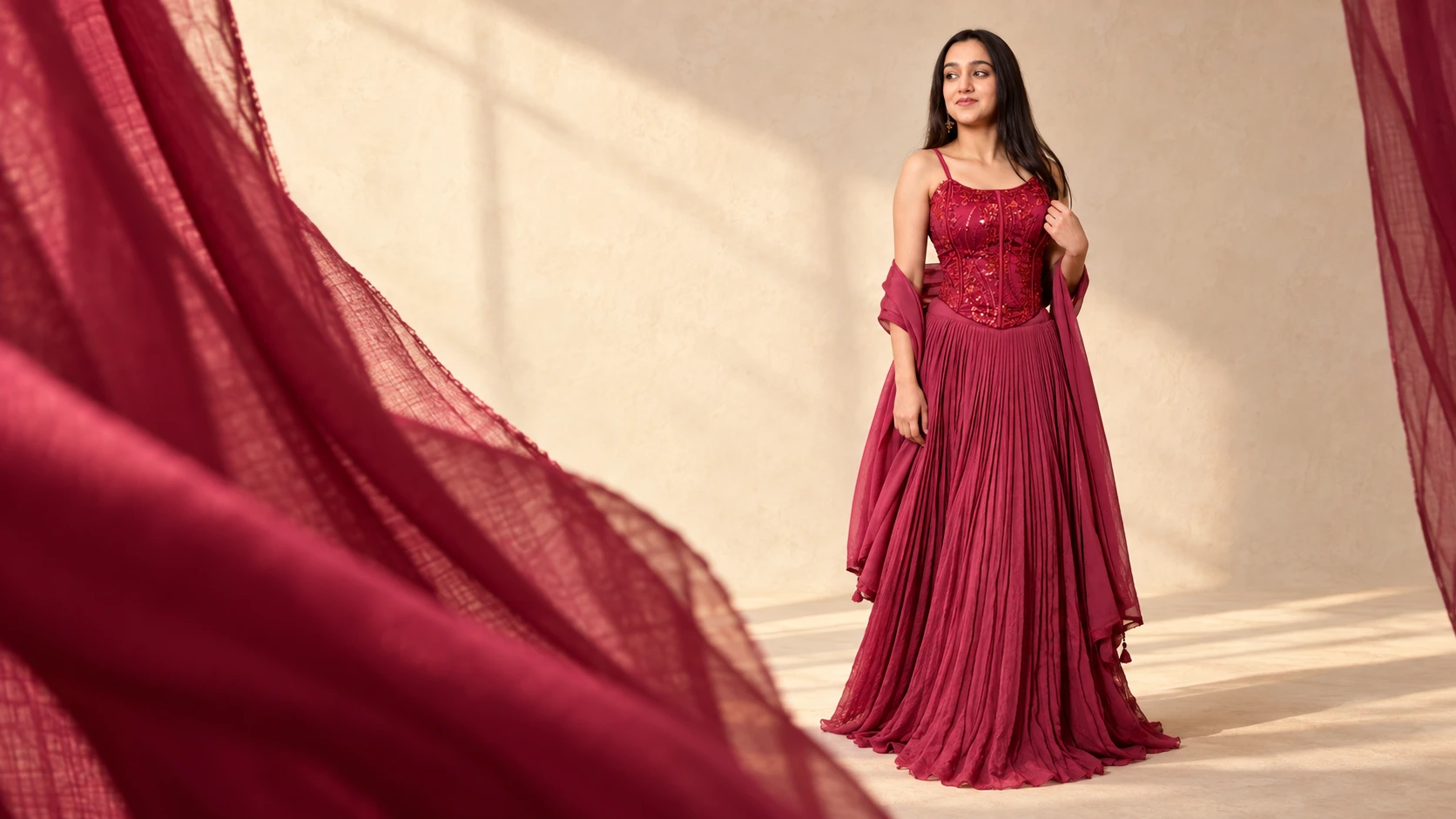Moving wine cloth opens onto a complete silhouette in a sunlit courtyard.
